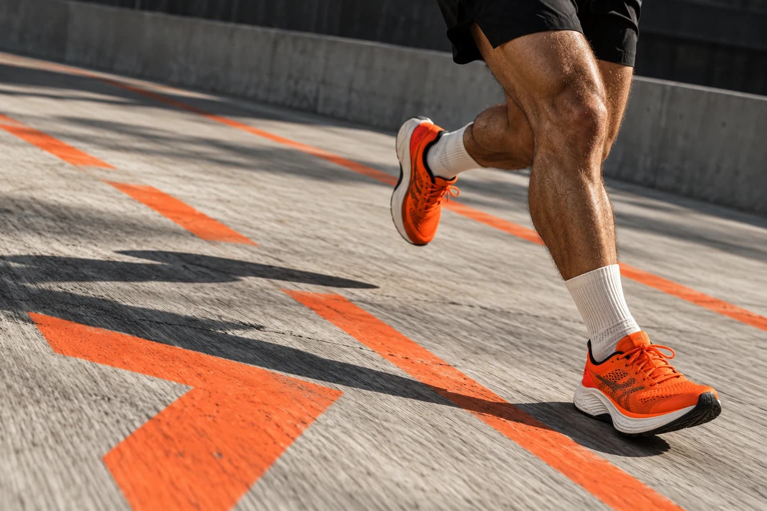 Illustrative SHIFT sports campaign featuring orange running shoes in motion
